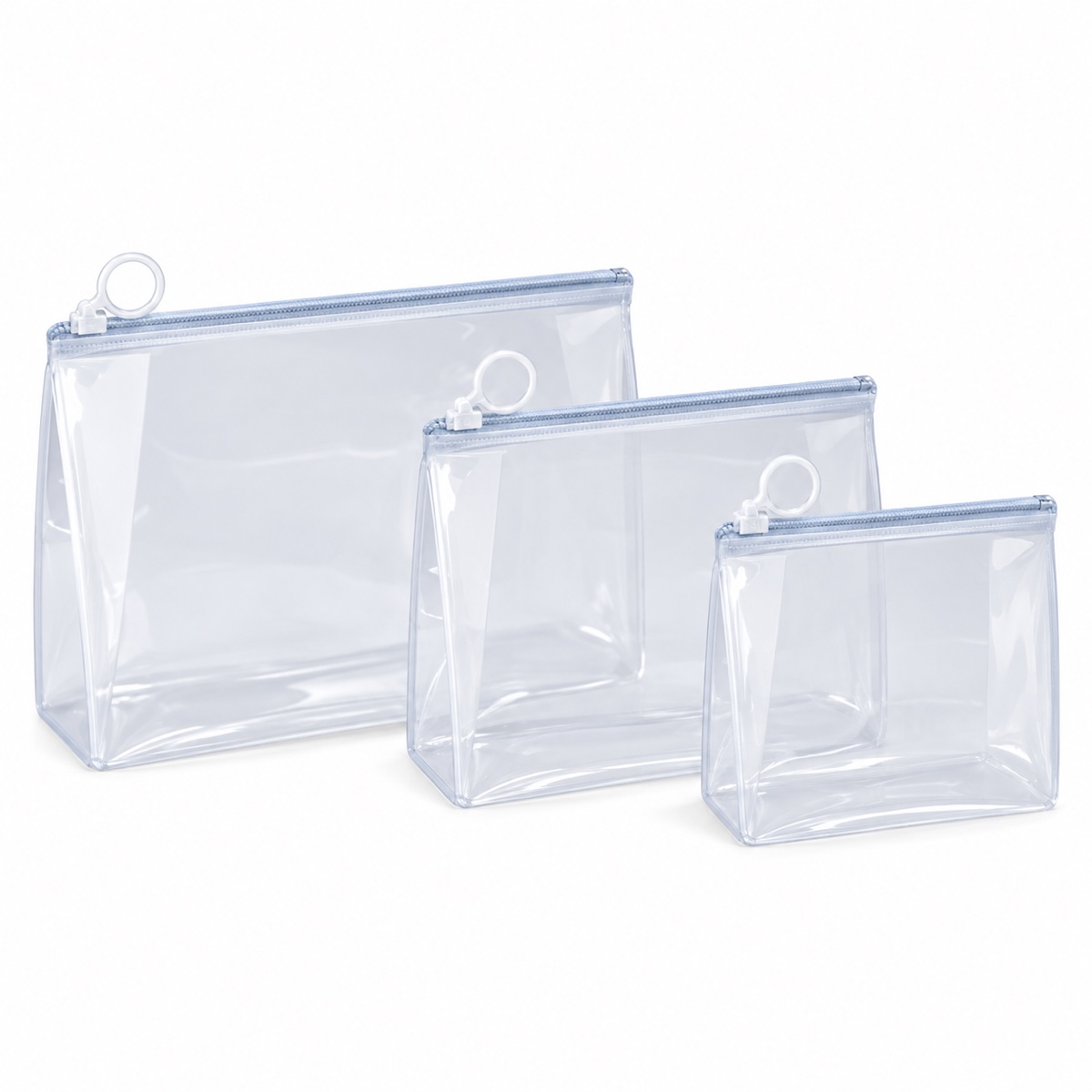 Kit de necessaires transparentes de PVC com puxadores de argola OEM ODM · Necessaires cosméticos e de viagem product reference